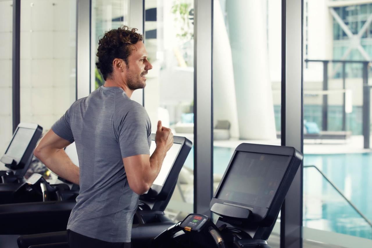 The Westin Brisbane Hotel Exterior photo A man on a treadmill